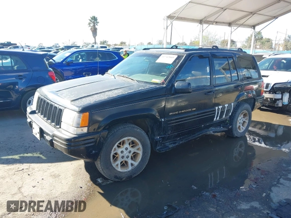 1998 Jeep Grand Cherokee Limited z VIN 1J4GZ78Y3WC105625, wystawiony jako IAAI lot #41742805 z przebiegiem 222 045 mil mil oraz . Historia ofert i sprzedaży dostępna na DreamBid. Obrazek 2.