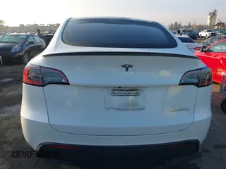 2021 Tesla Model Y Performance with VIN 5YJYGDEF2MF258711, listed as a IAAI auction lot 41367832 with 47,662 mi miles and . Bid and sale history available at DreamBid. Image 16.