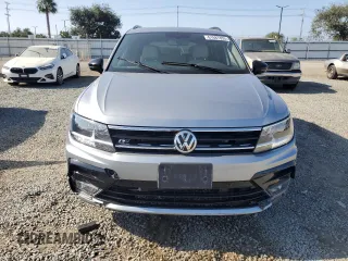 2021 Volkswagen Tiguan SE z VIN 3VV3B7AX1MM096446, wystawiony jako Copart lot #61687855 z przebiegiem 50 798 mil mil oraz Szkoda całkowita • Salvage title. Historia ofert i sprzedaży dostępna na DreamBid. Obrazek 5.
