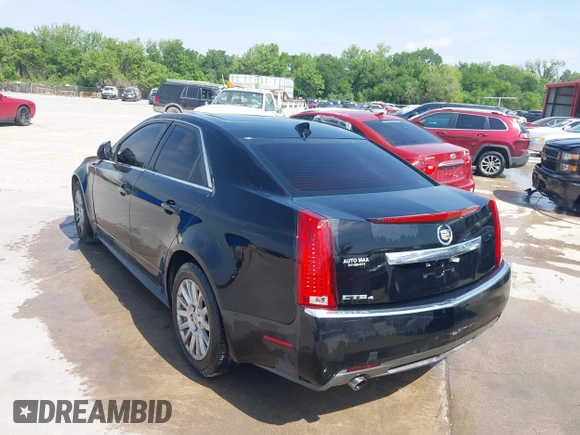 2012 Cadillac CTS Sedan Luxury with VIN 1G6DG5E58C0115323, listed as a IAAI auction lot 42002818 with 107,226 mi miles. Bid and sale history available at carsss.com. Image 3.