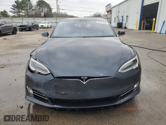 2016 Tesla Model S 90D with VIN 5YJSA1E20GF168108, listed as a Copart auction lot 55589615 with 138,295 mi miles and Salvage Title. Bid and sale history available at DreamBid. Image 5.