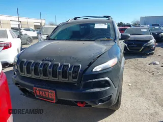 2017 Jeep Cherokee Trailhawk L Plus with VIN 1C4PJMBBXHW634944, listed as a IAAI auction lot 41022673 with 116,542 mi miles. Bid and sale history available at carsss.com. Image 13.
