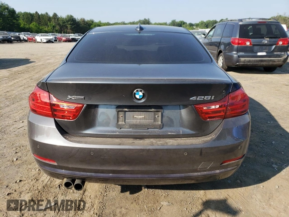 2016 BMW 4 Series 428i xDrive with VIN WBA3N9C53GK251004, listed as a Copart auction lot 58945725 with 111,619 mi miles and Salvage title. Bid and sale history available at DreamBid. Image 6.