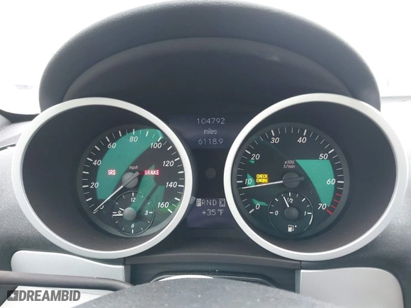 2005 Mercedes-Benz SLK-Class with VIN WDBWK56FX5F075529, listed as a IAAI auction lot 41535391 with 104,792 mi miles. Bid and sale history available at carsss.com. Image 7.
