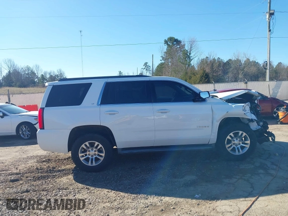 2015 Chevrolet Tahoe LT with VIN 1GNSCBKC0FR104096, listed as a IAAI auction lot 41679298 with 231,005 mi miles and . Bid and sale history available at DreamBid. Image 13.
