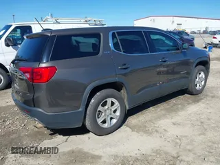 2019 GMC Acadia SLE with VIN 1GKKNKLA1KZ199136, listed as a IAAI auction lot 41596600 with 140,599 mi miles. Bid and sale history available at carsss.com. Image 4.