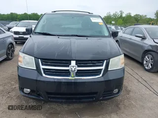 2010 Dodge Grand Caravan SXT z VIN 2D4RN5D12AR444953, wystawiony jako IAAI lot #42247277 z przebiegiem 214 387 mil mil oraz . Historia ofert i sprzedaży dostępna na DreamBid. Obrazek 12.