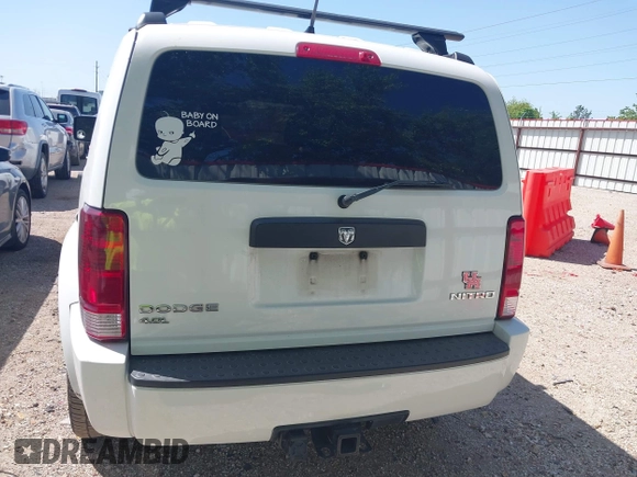 2011 Dodge Nitro Heat with VIN 1D4PT4GX9BW587284, listed as a IAAI auction lot 41998357 with 100,366 mi miles and . Bid and sale history available at DreamBid. Image 16.