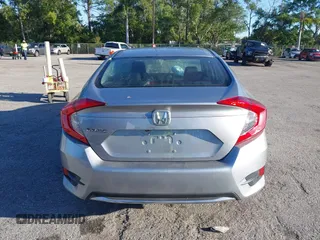 2020 Honda Civic LX with VIN 19XFC2F63LE004953, listed as a IAAI auction lot 41824922 with 71,458 mi miles and . Bid and sale history available at DreamBid. Image 16.