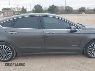 2017 Ford Fusion Titanium with VIN 3FA6P0SU8HR104727, listed as a IAAI auction lot 41242482 with 83,021 mi miles and . Bid and sale history available at DreamBid. Image 14.