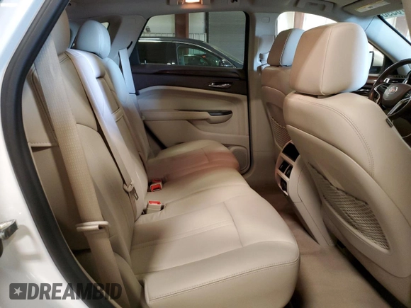 2015 Cadillac SRX Luxury Collection z VIN 3GYFNEE33FS641781, wystawiony jako Copart lot #50765905 z przebiegiem Nie podano mil oraz Szkody całkowita. Historia ofert i sprzedaży dostępna na DreamBid. Obrazek 12.