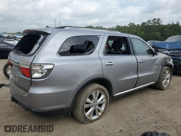2013 Dodge Durango Crew z VIN 1C4RDHDG9DC687114, wystawiony jako Copart lot #53514085 z przebiegiem 116 120 mil mil oraz Szkoda całkowita • Salvage title. Historia ofert i sprzedaży dostępna na DreamBid. Obrazek 3.