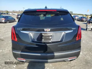 2023 Cadillac XT5 FWD Premium Luxury with VIN 1GYKNCR48PZ132957, listed as a Copart auction lot 42132845 with 27,312 mi miles and Salvage Title. Bid and sale history available at carsss.com. Image 6.
