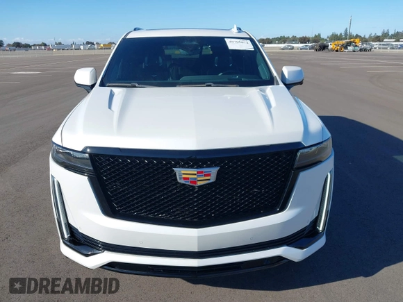 2023 Cadillac Escalade 4WD Sport z VIN 1GYS4FKL7PR286940, wystawiony jako IAAI lot #40702874 z przebiegiem 7 981 mil mil oraz . Historia ofert i sprzedaży dostępna na DreamBid. Obrazek 6.