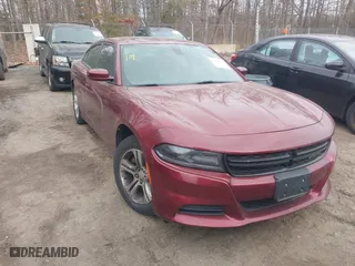 2019 Dodge Charger SXT with VIN 2C3CDXBG8KH695268, listed as a IAAI auction lot 41241876 with 73,782 mi miles. Bid and sale history available at carsss.com. Image 1.