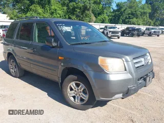 2007 Honda Pilot LX z VIN 2HKYF18117H530057, wystawiony jako IAAI lot #42196817 z przebiegiem 218 813 mil mil oraz . Historia ofert i sprzedaży dostępna na DreamBid. Obrazek 1.