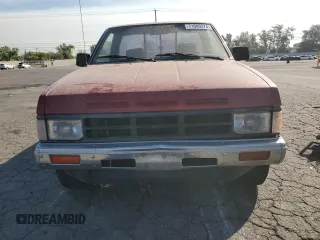 1989 Nissan Hardbody z VIN 1N6ND11S0KC342434, wystawiony jako Copart lot #71089274 z przebiegiem 300 076 mil mil oraz Szkody całkowita. Historia ofert i sprzedaży dostępna na DreamBid. Obrazek 5.