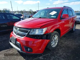 2017 Dodge Journey SXT z VIN 3C4PDDBG1HT577753, wystawiony jako IAAI lot #41855579 z przebiegiem 123 185 mil mil oraz . Historia ofert i sprzedaży dostępna na DreamBid. Obrazek 2.