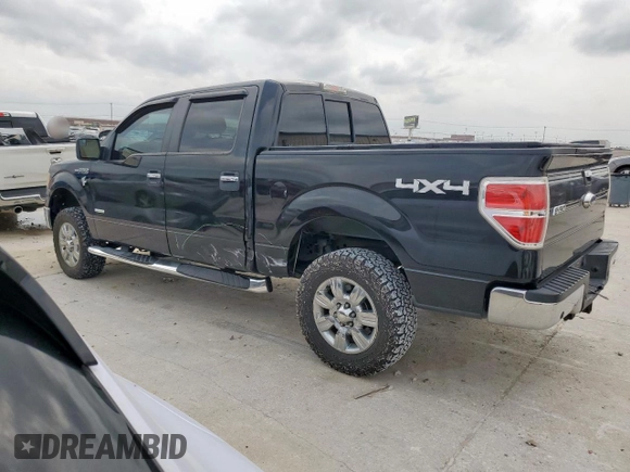 2012 Ford F-150 XL with VIN 1FTFW1ETXCFB32623, listed as a Copart auction lot 54597435 with 210,722 mi miles and Salvage Title. Bid and sale history available at DreamBid. Image 2.