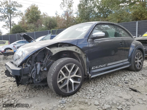 2018 Volkswagen Beetle Dune with VIN 3VWSD7AT4JM709024, listed as a Copart auction lot 73713754 with 50,879 mi miles and Salvage Title. Bid and sale history available at carsss.com. Image 1.