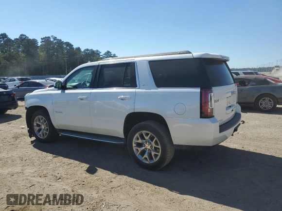 2016 GMC Yukon SLT with VIN 1GKS1BKC4GR138658, listed as a Copart auction lot 76634664 with 132,358 mi miles and Salvage Title. Bid and sale history available at carsss.com. Image 2.