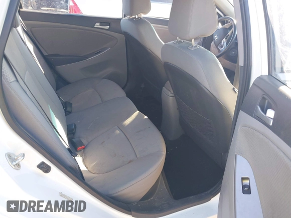 2015 Hyundai Accent Sport with VIN KMHCU5AE9FU205662, listed as a IAAI auction lot 41384496 with 80,133 mi miles. Bid and sale history available at carsss.com. Image 8.