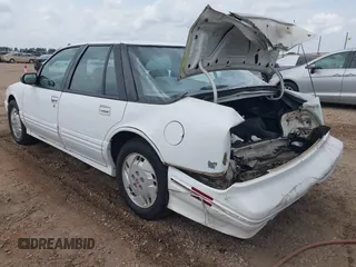 1997 Oldsmobile Cutlass Supreme S z VIN 1G3WH52M1VF314714, wystawiony jako IAAI lot #42092566 z przebiegiem 122 959 mil mil oraz . Historia ofert i sprzedaży dostępna na DreamBid. Obrazek 3.