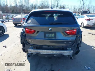 2018 BMW X1 xDrive28i z VIN WBXHT3C31J3H31737, wystawiony jako IAAI lot #41698670 z przebiegiem 68 017 mil mil oraz . Historia ofert i sprzedaży dostępna na DreamBid. Obrazek 17.