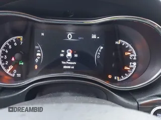 2021 Jeep Grand Cherokee 80th Anniversary with VIN 1C4RJFBG2MC614814, listed as a IAAI auction lot 41486793 with 88,089 mi miles and . Bid and sale history available at DreamBid. Image 7.