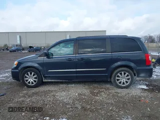 2013 Chrysler Town & Country Touring with VIN 2C4RC1BGXDR613852, listed as a IAAI auction lot 40973841 with 150,234 mi miles. Bid and sale history available at carsss.com. Image 14.