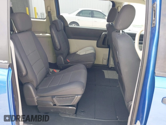 2008 Dodge Grand Caravan SE with VIN 2D8HN44H08R772738, listed as a IAAI auction lot 42046698 with 76,165 mi miles and . Bid and sale history available at DreamBid. Image 8.