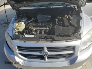 2007 Dodge Caliber with VIN 1B3HB28B07D111196, listed as a Copart auction lot 52488495 with 123,409 mi miles and Salvage Title. Bid and sale history available at DreamBid. Image 12.