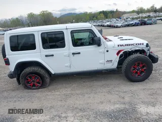 2021 Jeep Wrangler Unlimited Rubicon z VIN 1C4HJXFG1MW577829, wystawiony jako IAAI lot #41997002 z przebiegiem 26 443 mil mil oraz . Historia ofert i sprzedaży dostępna na DreamBid. Obrazek 14.