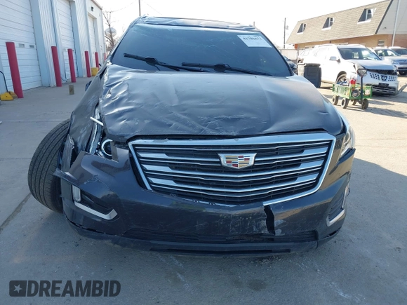 2017 Cadillac XT5 Luxury FWD with VIN 1GYKNBRS0HZ105603, listed as a IAAI auction lot 41786673 with 75,482 mi miles. Bid and sale history available at carsss.com. Image 6.