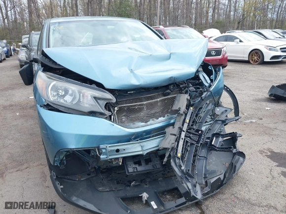 2014 Honda CR-V LX with VIN 2HKRM3H32EH517323, listed as a IAAI auction lot 42020715 with 121,389 mi miles. Bid and sale history available at carsss.com. Image 6.