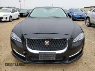 2017 Jaguar XJ R-Sport with VIN SAJWA1C77H8W04956, listed as a Copart auction lot 45174505 with 142,002 mi miles and Salvage title. Bid and sale history available at DreamBid. Image 5.