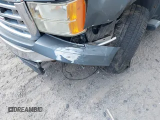 2007 GMC Sierra 1500 SLE1 z VIN 2GTEC13J971571282, wystawiony jako IAAI lot #41980128 z przebiegiem 221 024 mil mil oraz . Historia ofert i sprzedaży dostępna na DreamBid. Obrazek 6.