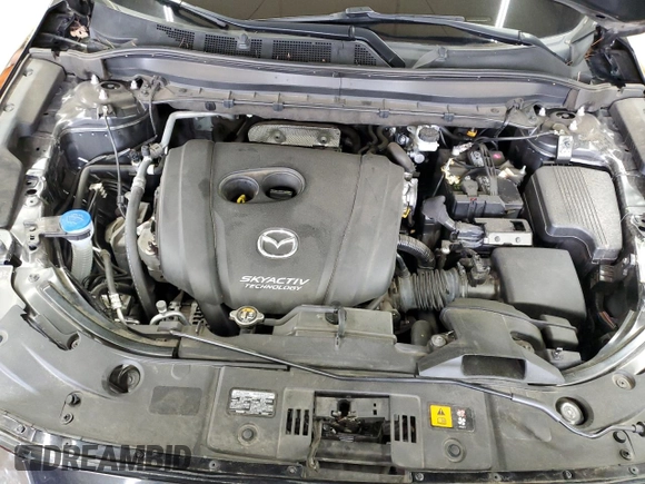 2019 Mazda CX-5 Touring with VIN JM3KFBCM4K0571793, listed as a Copart auction lot 49696825 with 97,305 mi miles and Salvage Title. Bid and sale history available at carsss.com. Image 12.