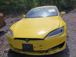 2016 Tesla Model S 70 kWh Battery with VIN 5YJSA1E14GF141579, listed as a IAAI auction lot 42209119 with 105,947 mi miles and . Bid and sale history available at carsss.com. Image 6.