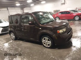 2009 Nissan Cube S z VIN JN8AZ28R39T124465, wystawiony jako IAAI lot #40769739 z przebiegiem 145 993 mil mil oraz . Historia ofert i sprzedaży dostępna na DreamBid. Obrazek 1.