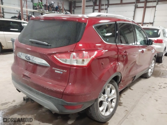 2014 Ford Escape Titanium with VIN 1FMCU9J9XEUA51732, listed as a IAAI auction lot 41542867 with 44,141 mi miles. Bid and sale history available at carsss.com. Image 4.