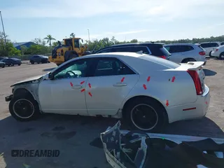 2009 Cadillac CTS RWD z VIN 1G6DF577190106800, wystawiony jako IAAI lot #42316470 z przebiegiem 147 836 mil mil oraz . Historia ofert i sprzedaży dostępna na DreamBid. Obrazek 15.