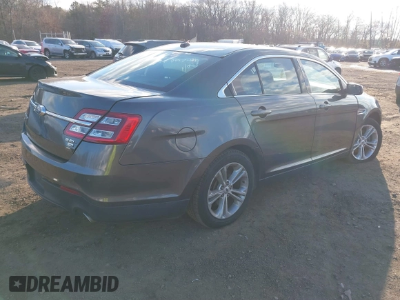 2015 Ford Taurus SEL with VIN 1FAHP2H86FG174102, listed as a IAAI auction lot 40997366 with 132,543 mi miles. Bid and sale history available at carsss.com. Image 4.
