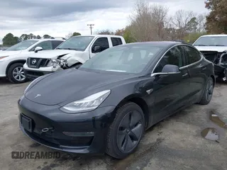 2019 Tesla Model 3 Mid Range with VIN 5YJ3E1EA3KF313425, listed as a IAAI auction lot 41806388 with 110,767 mi miles and . Bid and sale history available at carsss.com. Image 17.