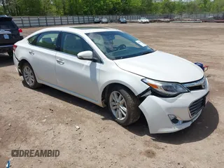 2014 Toyota Avalon Limited with VIN 4T1BK1EB4EU105266, listed as a IAAI auction lot 42006448 with 111,822 mi miles. Bid and sale history available at carsss.com. Image 1.