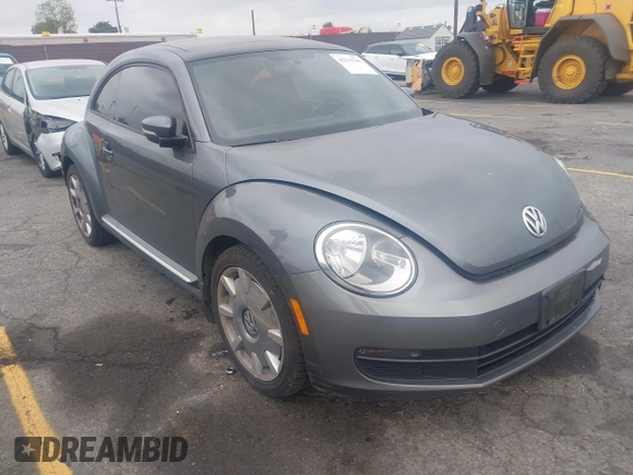 2013 Volkswagen Beetle 2.5L with VIN 3VWJP7AT6DM667477, listed as a IAAI auction lot 42215545 with 87,392 mi miles and . Bid and sale history available at DreamBid. Image 1.
