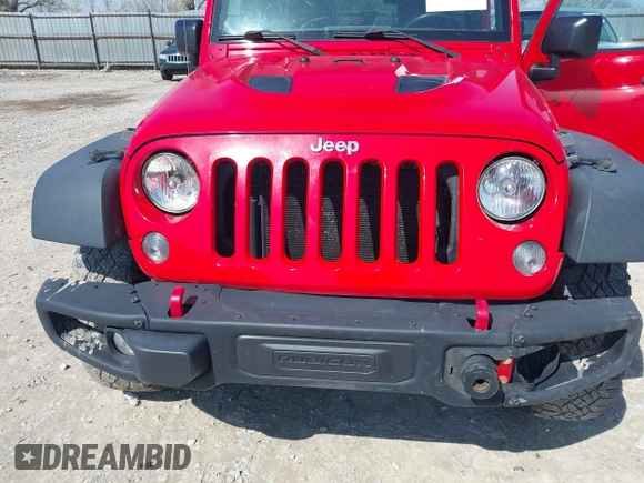 2015 Jeep Wrangler Unlimited Rubicon Hard Rock with VIN 1C4HJWFG9FL525556, listed as a IAAI auction lot 41973576 with 246,949 mi miles and . Bid and sale history available at DreamBid. Image 6.