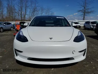 2023 Tesla Model 3 with VIN 5YJ3E1EA3PF610069, listed as a Copart auction lot 50327635 with 19,495 mi miles and Salvage Title. Bid and sale history available at carsss.com. Image 5.