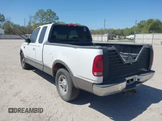 2003 Ford F-150 XL with VIN 1FTRX17L03NA16778, listed as a IAAI auction lot 41602179 with 219,101 mi miles. Bid and sale history available at carsss.com. Image 3.