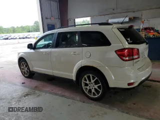 2013 Dodge Journey SXT with VIN 3C4PDDBG1DT521452, listed as a Copart auction lot 62660785 with 177,945 mi miles and Salvage title. Bid and sale history available at DreamBid. Image 2.